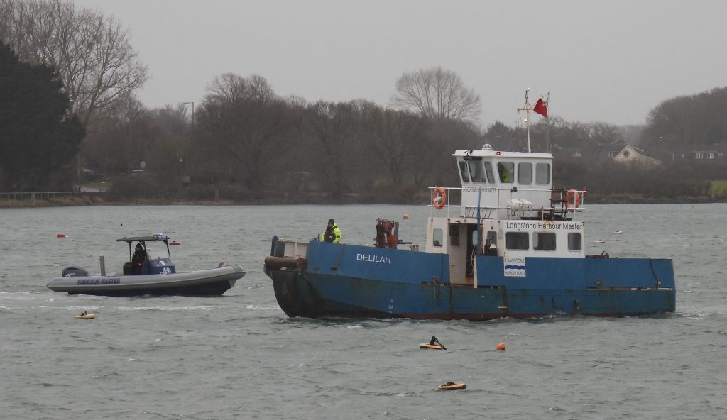 Teams from Chichester Harbour Conservancy and Langstone Harbour Board carry out oil spill exercise.